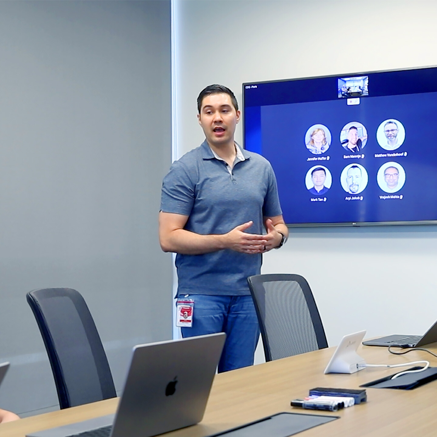 A man giving a presentation in a conference room